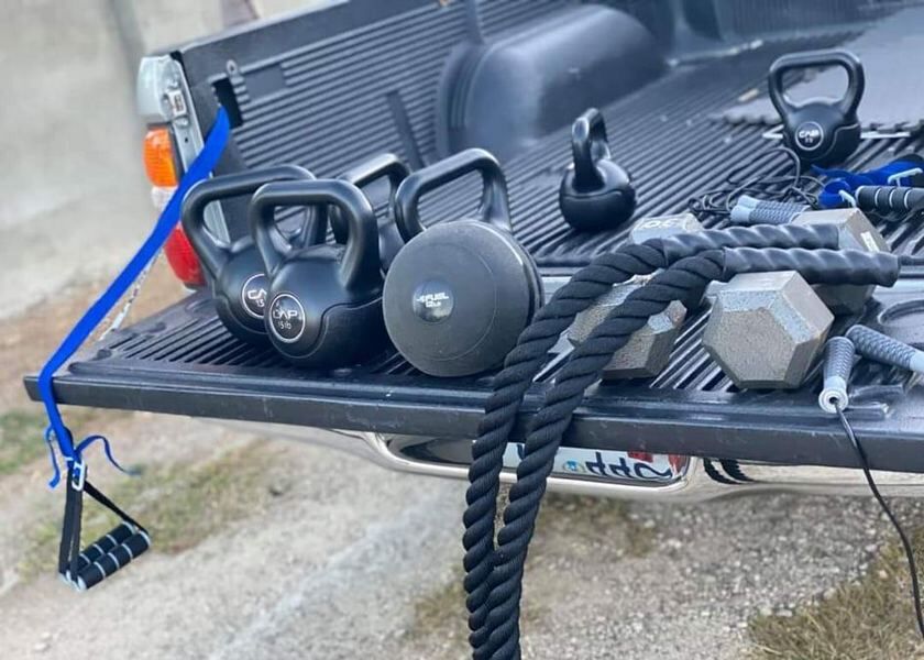 Coach Mike Mercado’s “mobile gym” helps him maintain his desired fitness level. Contributed photos