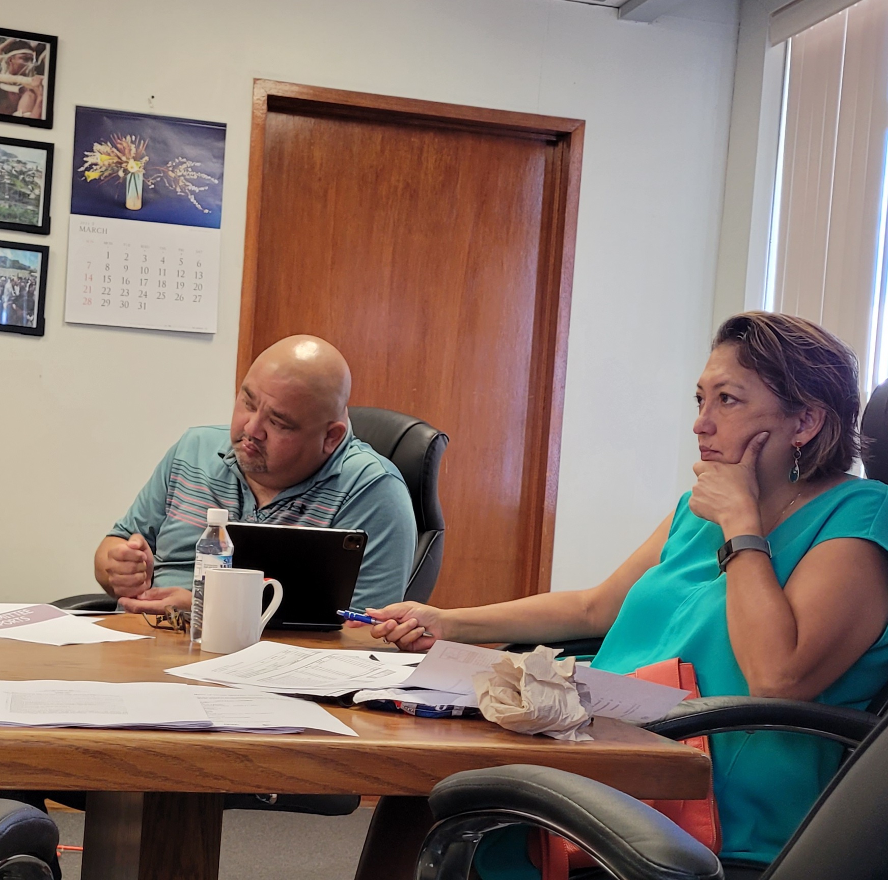 Marianas Visitors Authority acting chairwoman Gloria Cavanagh and board member Warren Villagomez listen during a board discussion on Tuesday.Photo by Bryan Manabat
