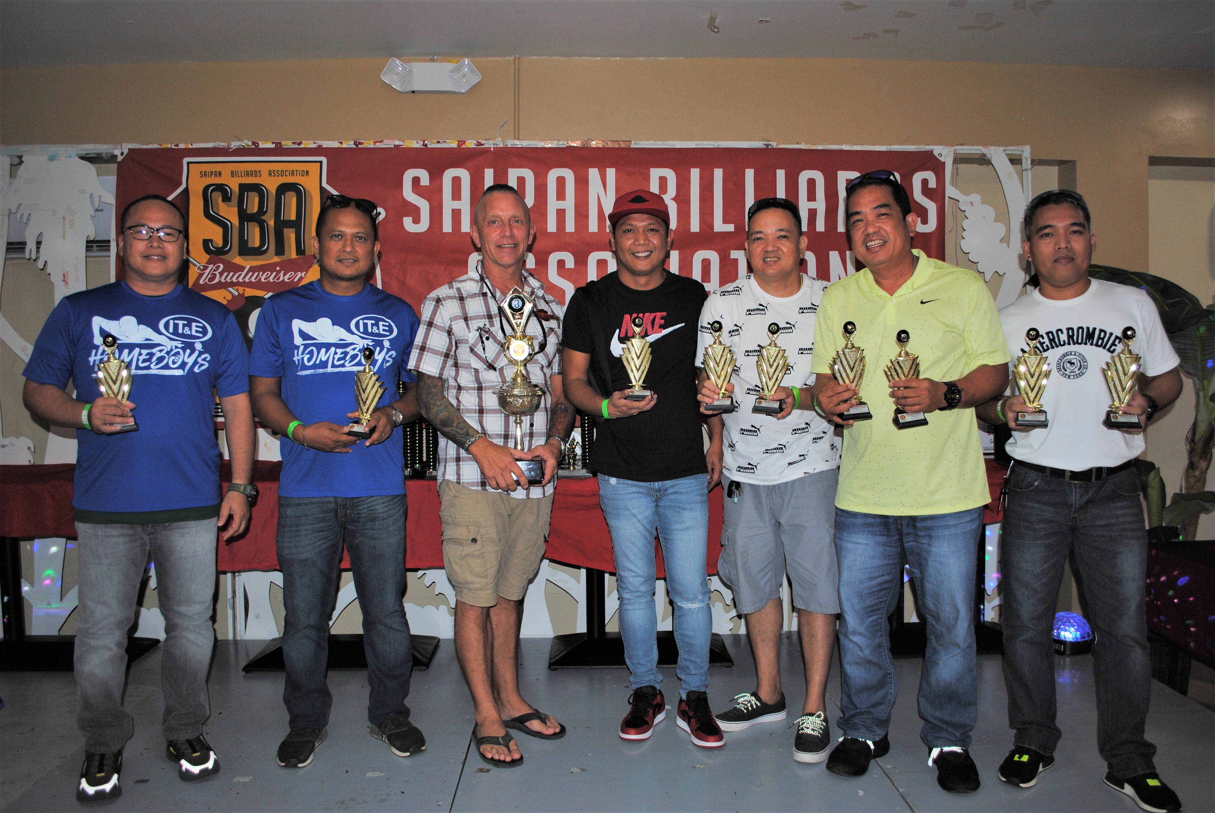 The Last Shot IT&E Destroyers pose with the Tuesday Bud Cup trophies.