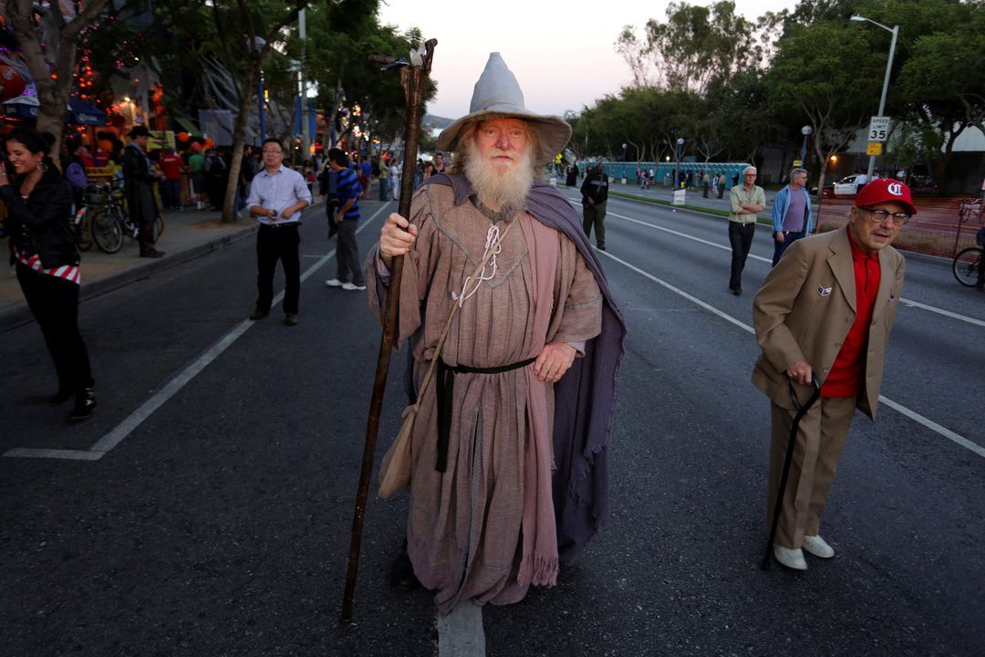 A man dressed as the character Gandalf the Grey from "Lord of the Rings" participates in the West Hollywood Halloween Costume Carnaval, which attracts nearly 500,000 people annually in West Hollywood, California, Oct. 31, 2013.