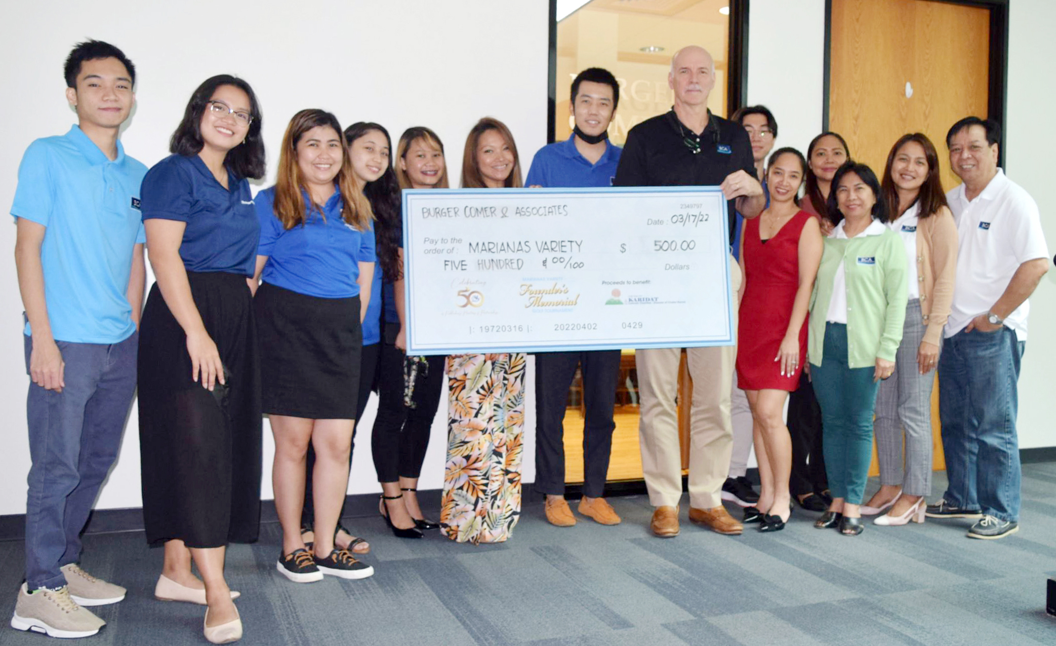 Burger Comer Magliari Certified Public Accountants managing partner David J. Burger, seventh right, auditing manager Jocelyn Doreza, fifth right and staff members pose for a photo with Marianas Variety accounting department's Jennifer T. Younis, sixth left, and sales representatives Hazel Sadian, Gwendolyn Sandig, Monique Mascarinas, and Diane Lumapas. Burger Comer Magliari  donated $500 to the MV Founder's Memorial Golf Tournament which aims to raise funds for Karidat.