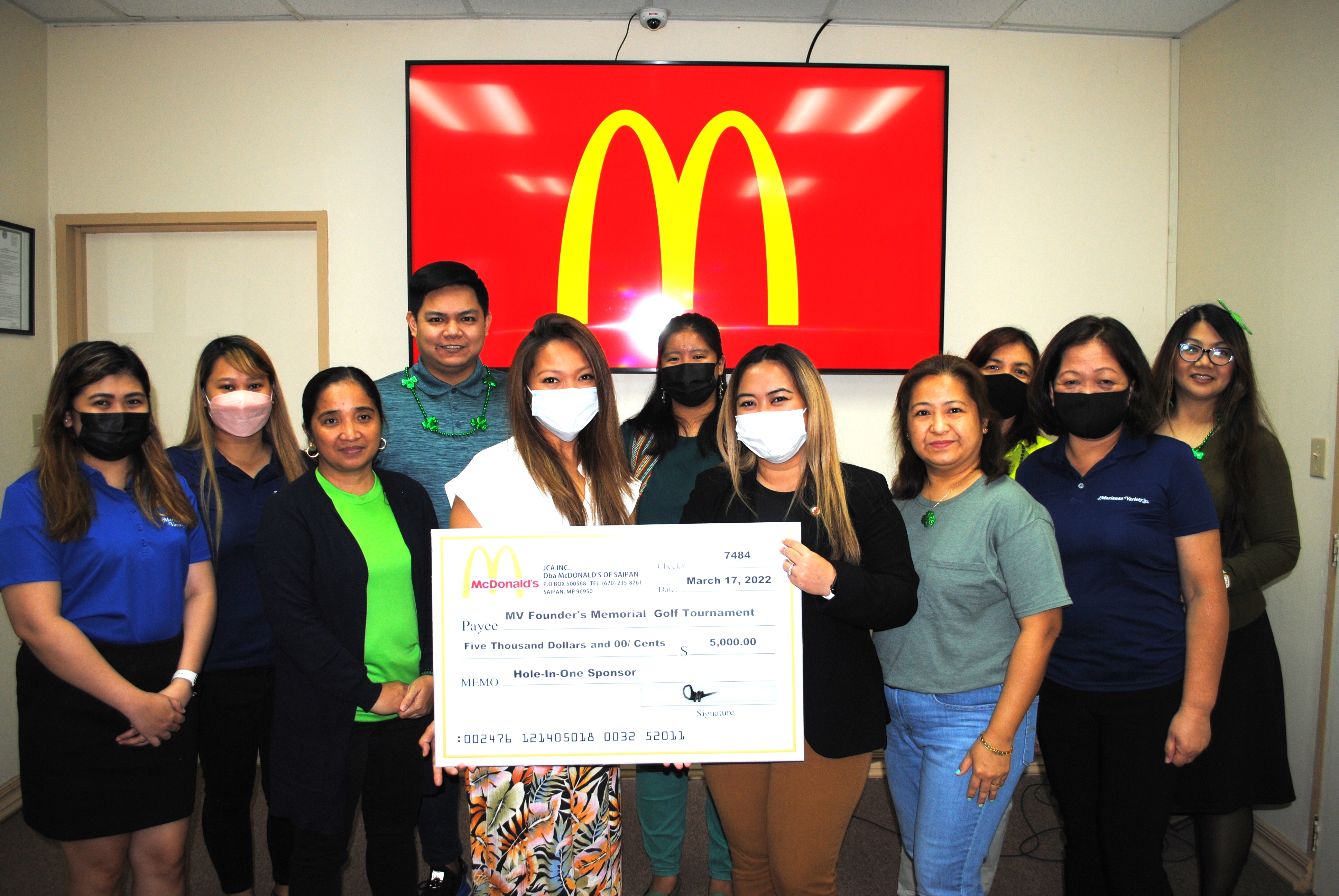 At the McDonald's office in Dandan on Thursday, McDonald’s Saipan and Guam executive assistant to the president Mable A. Glenn and staff pose with Marianas Variety’s accounts receivable clerk Jennifer Younis, advertising and sales executives Dianne Lumapas and Gwendolyn Sandig, and account executive and advertising manager Jeanette Sarabia during the presentation of McDonald’s $5,000 hole-in-one donation to the Marianas Variety Founder’s Memorial Golf Tournament set for Saturday, April 2 at 6 a.m., LaoLao Bay Golf & Resort, West Course.