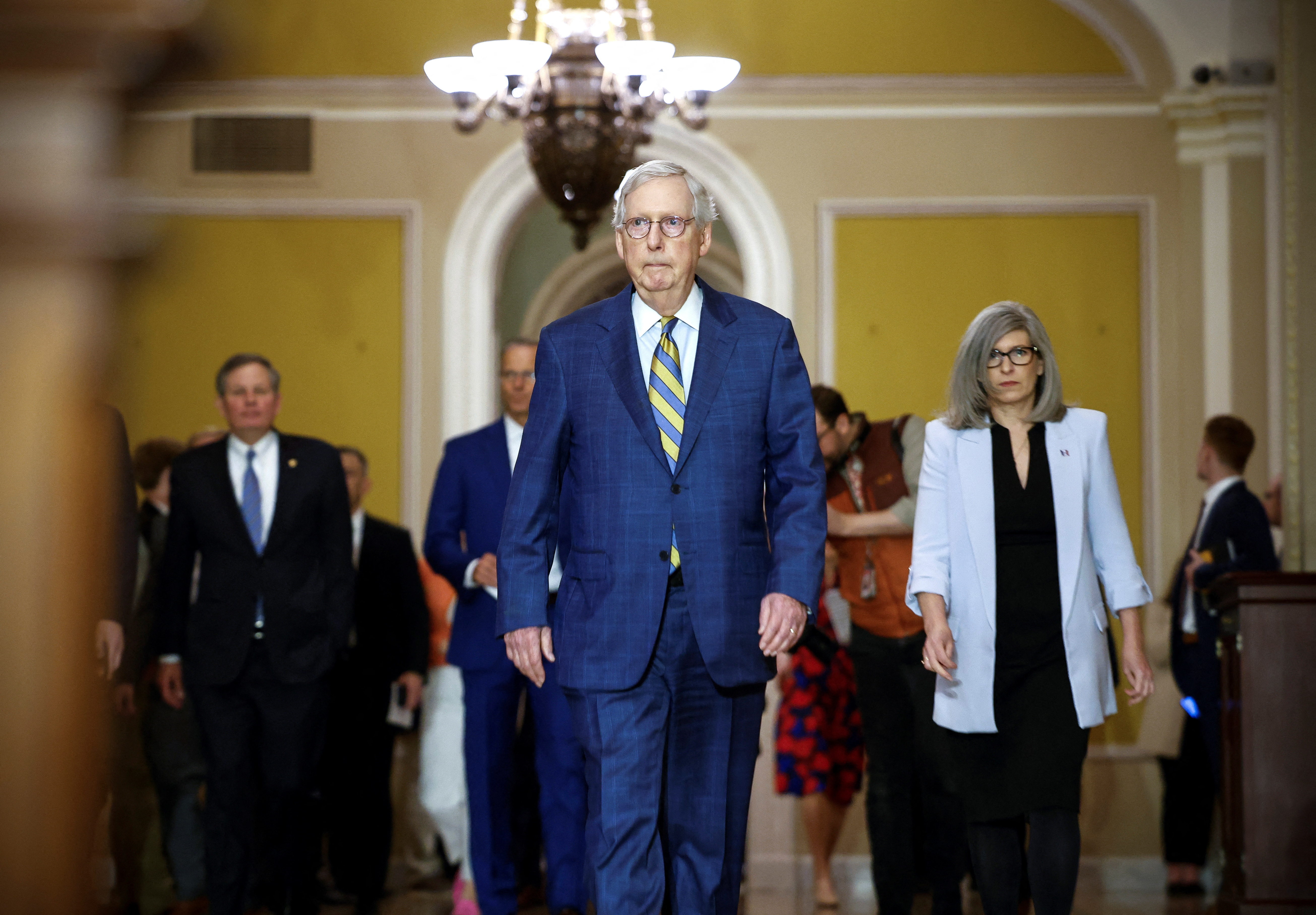 Senate Minority Leader Mitch McConnell (R-KY) walks to the weekly Republican press conference at the U.S. Capitol in Washington, U.S., March 7, 2023. REUTERS/Evelyn Hockstein