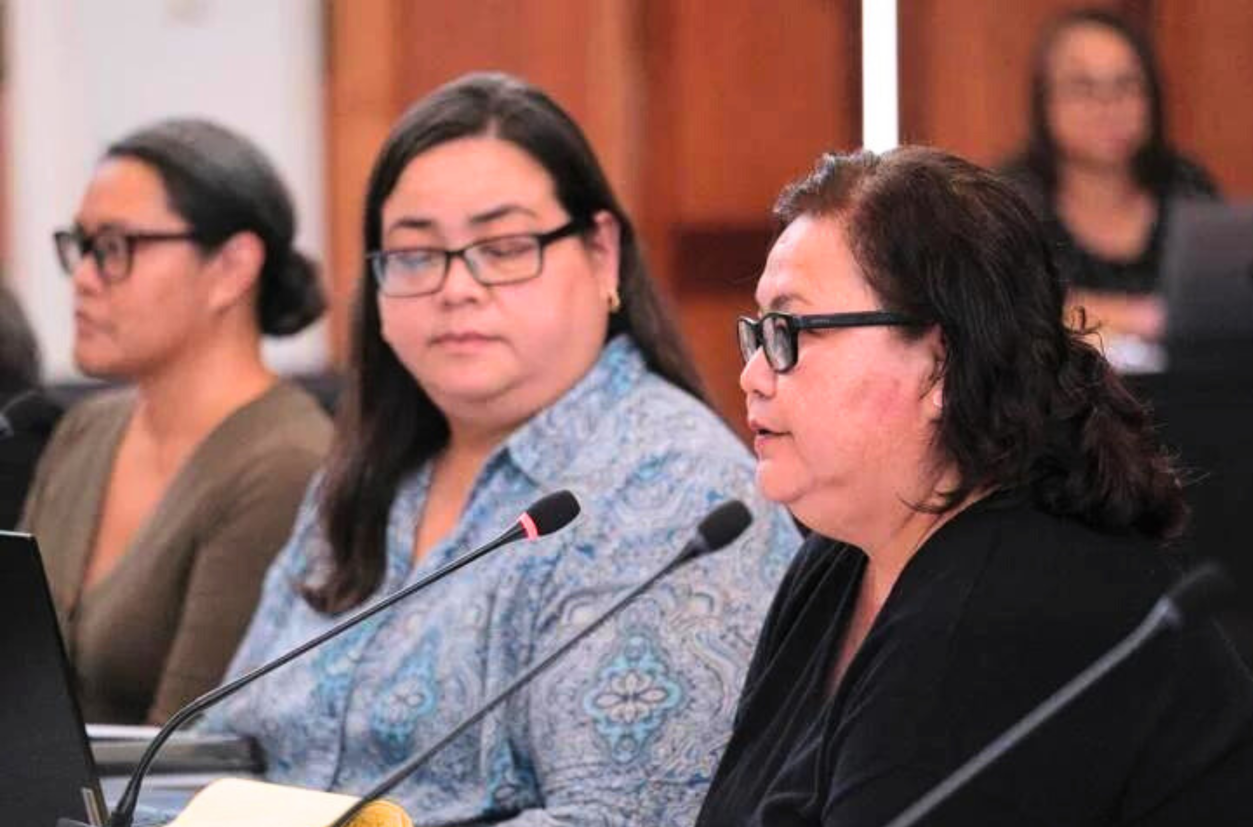 Charlene San Nicolas, right, acting director of the Department of Public Health and Social Services, speaks during an oversight hearing on improvements to foster parent eligibility and background check requirements Tuesday, April 18, 2023, at the Guam Congress Building in Hagåtña.