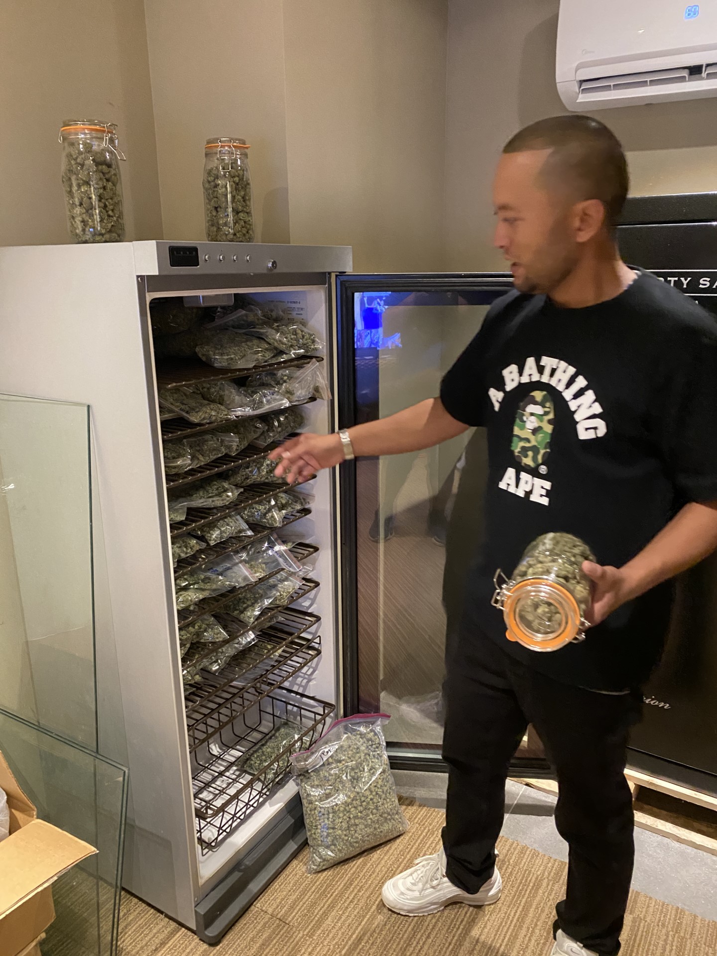 General Manager Nick Sablan shows some of the products ready for retail at The Hook Up.