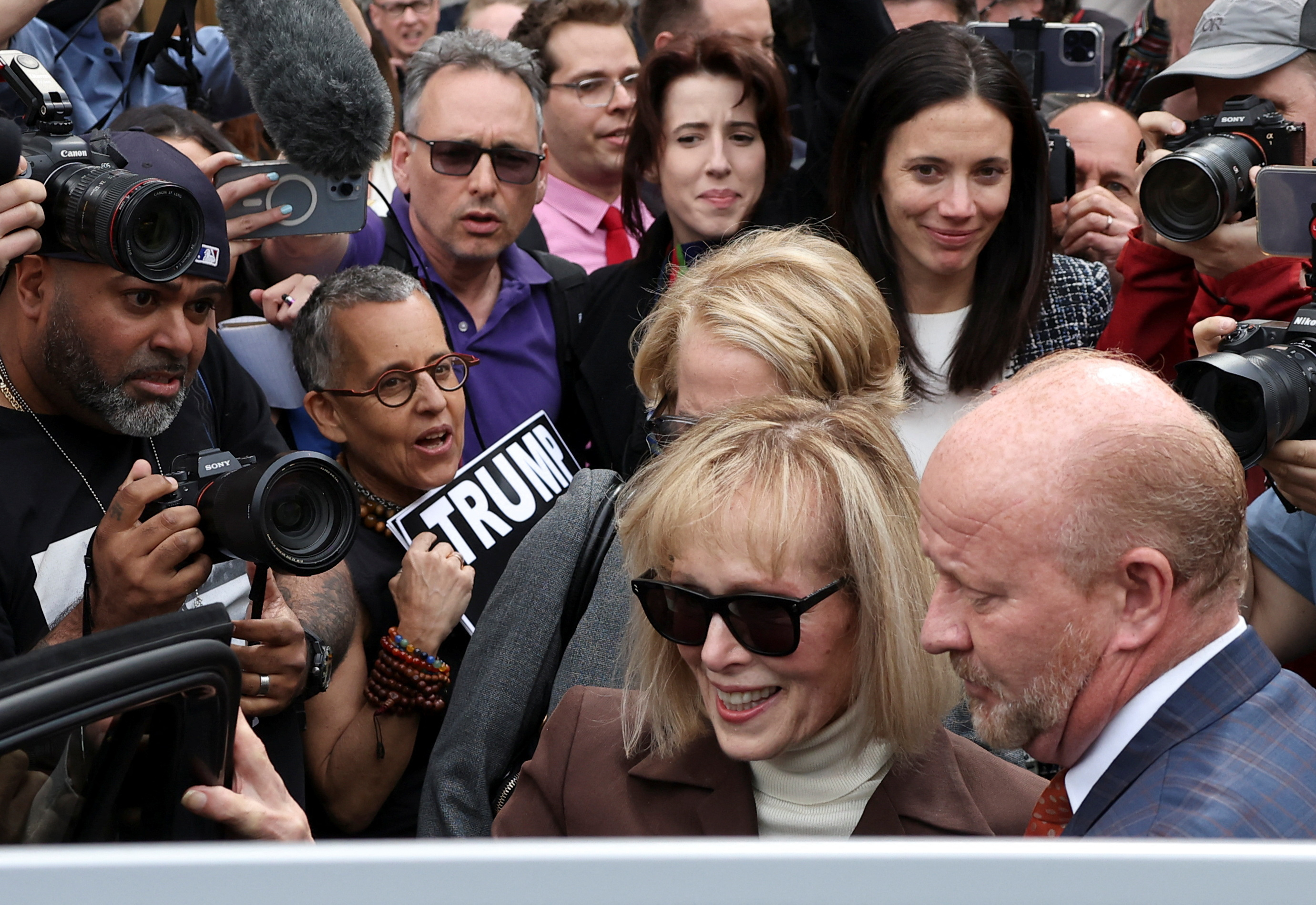 E. Jean Carroll departs from the Manhattan Federal Court following the verdict in the civil rape accusation case against former U.S. President Donald Trump, in New York City, U.S., May 9, 2023. REUTERS/Andrew Kelly