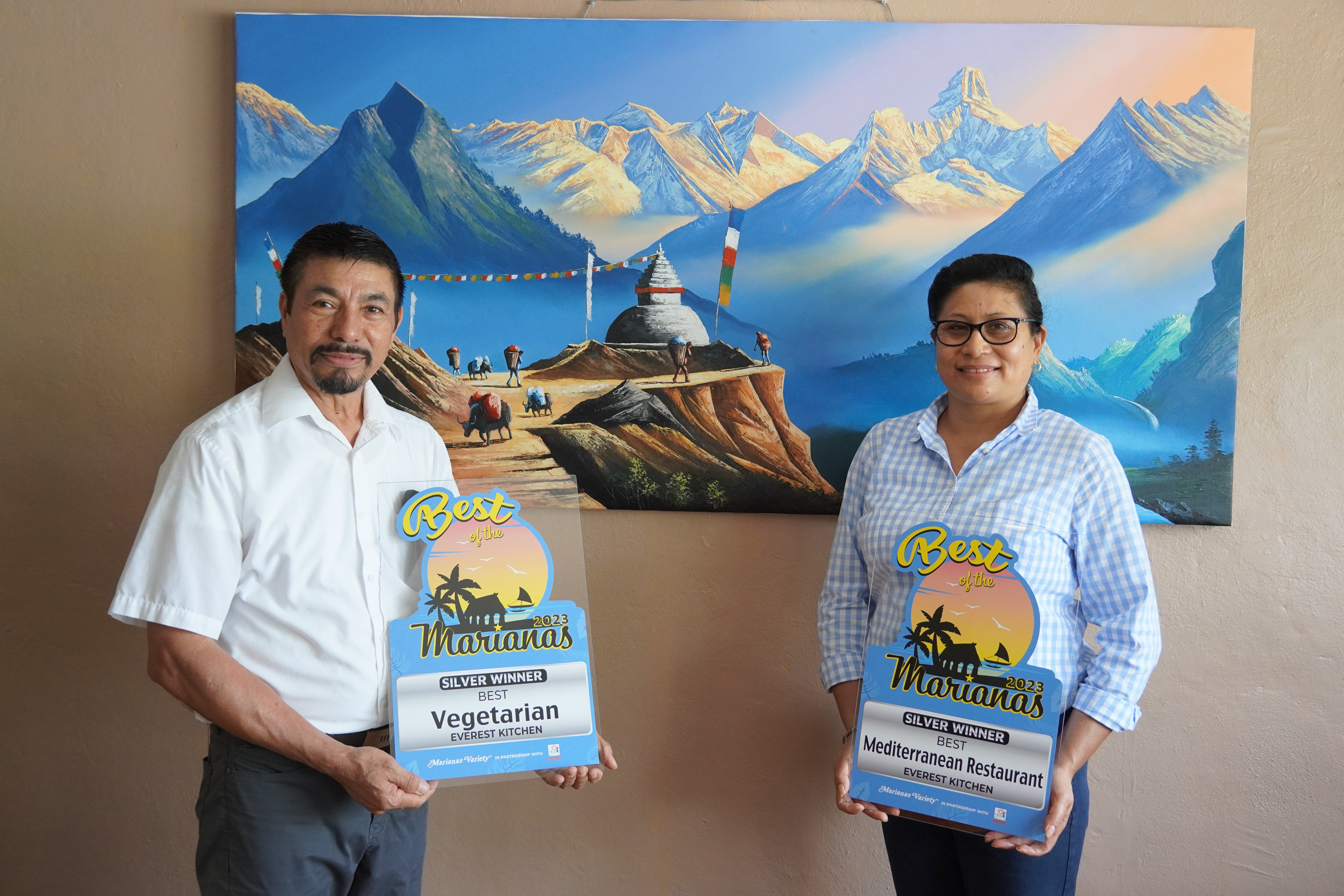 Chola Gharti and Laxmi Shrestha of Everest Kitchen receive their Silver award for Best Vegetarian Restaurant and Best Mediterranean Restaurant.