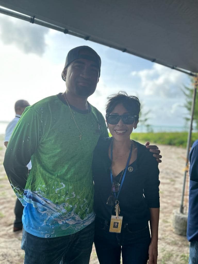 Bwiibwii's Professional Lawn Care Services owner Ben Lisua and Rep. Marissa Flores