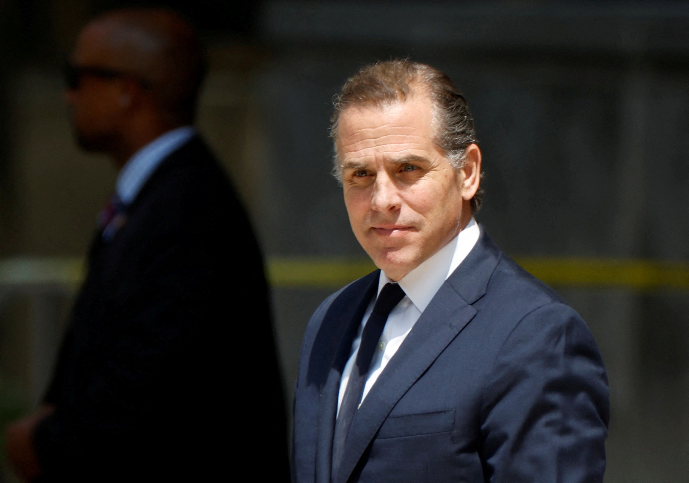Hunter Biden, son of U.S. President Joe Biden, departs federal court after a plea hearing on two misdemeanor charges of willfully failing to pay income taxes in Wilmington, Delaware, U.S. July 26, 2023. REUTERS/Jonathan Ernst/File Photo