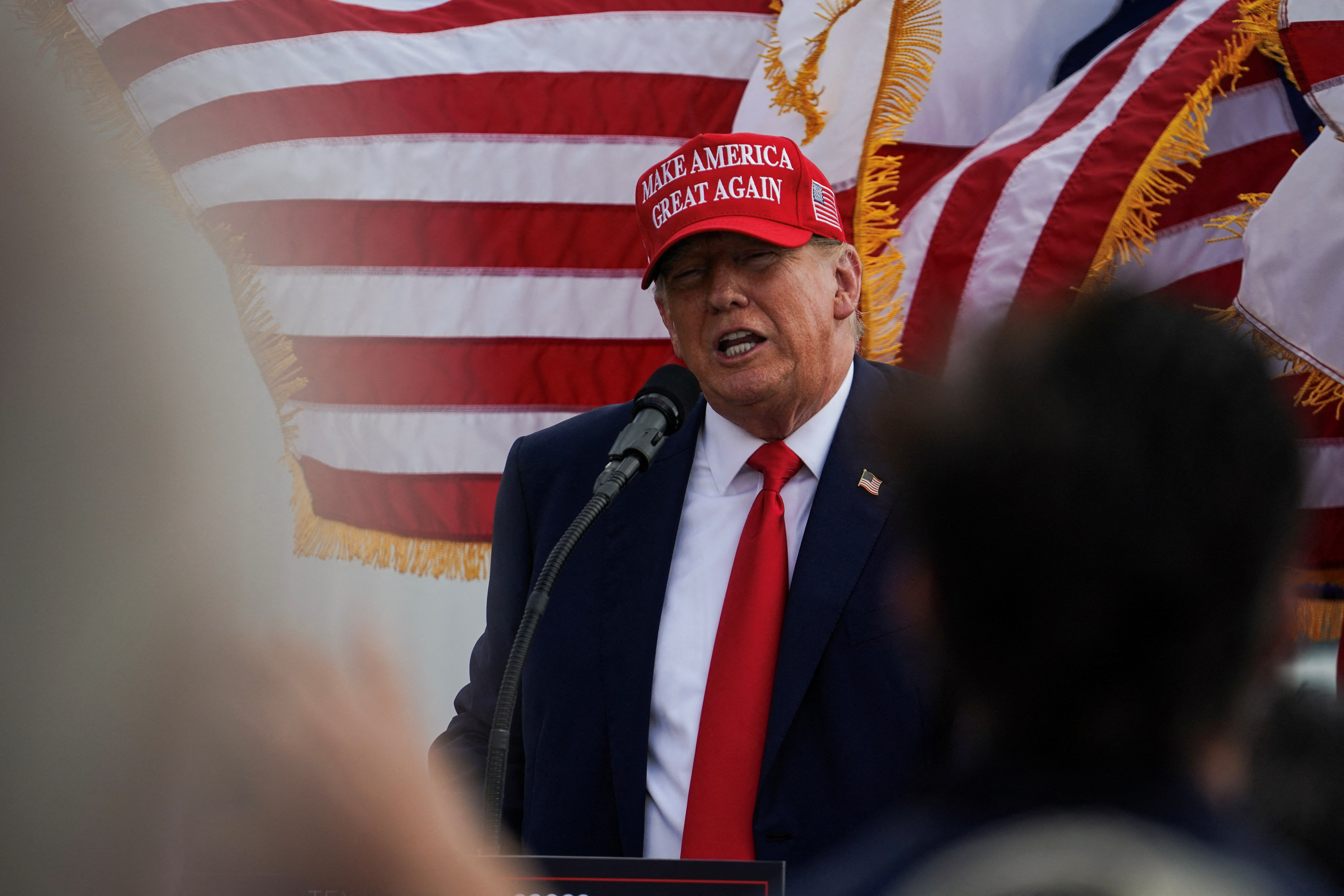 Republican presidential candidate and former U.S. President Donald Trump visits the southern border with Texas Governor Greg Abbott in Edinburg, Texas, U.S. November 19, 2023. 