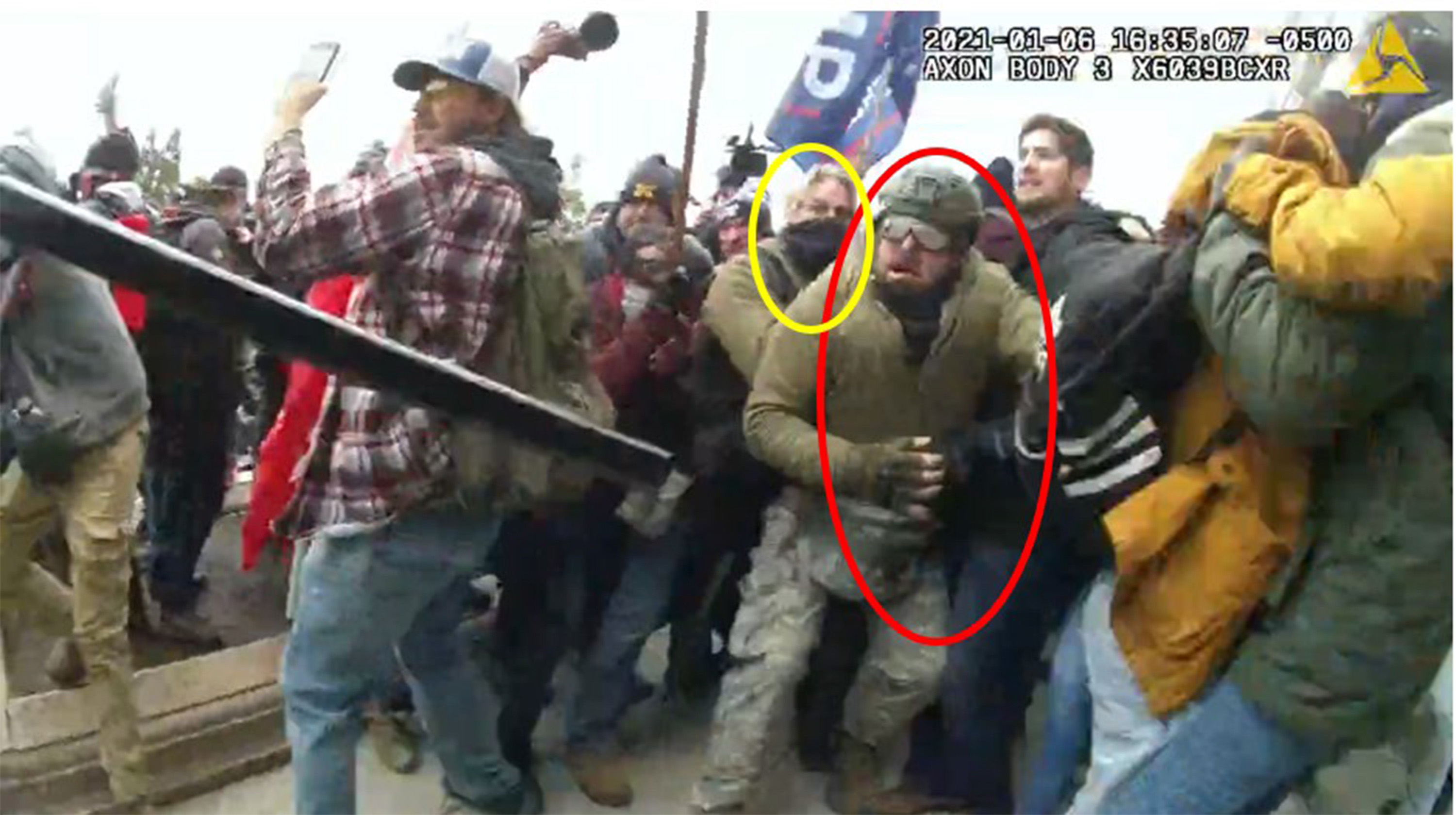 George Rockey (circled in red) and Edward Picquet (circled in yellow), both of South Carolina, were caught by a police body camera as they were alleged to have stormed the U.S. Capitol on Jan. 6, 2021. (U.S. Attorney's Office/TNS)