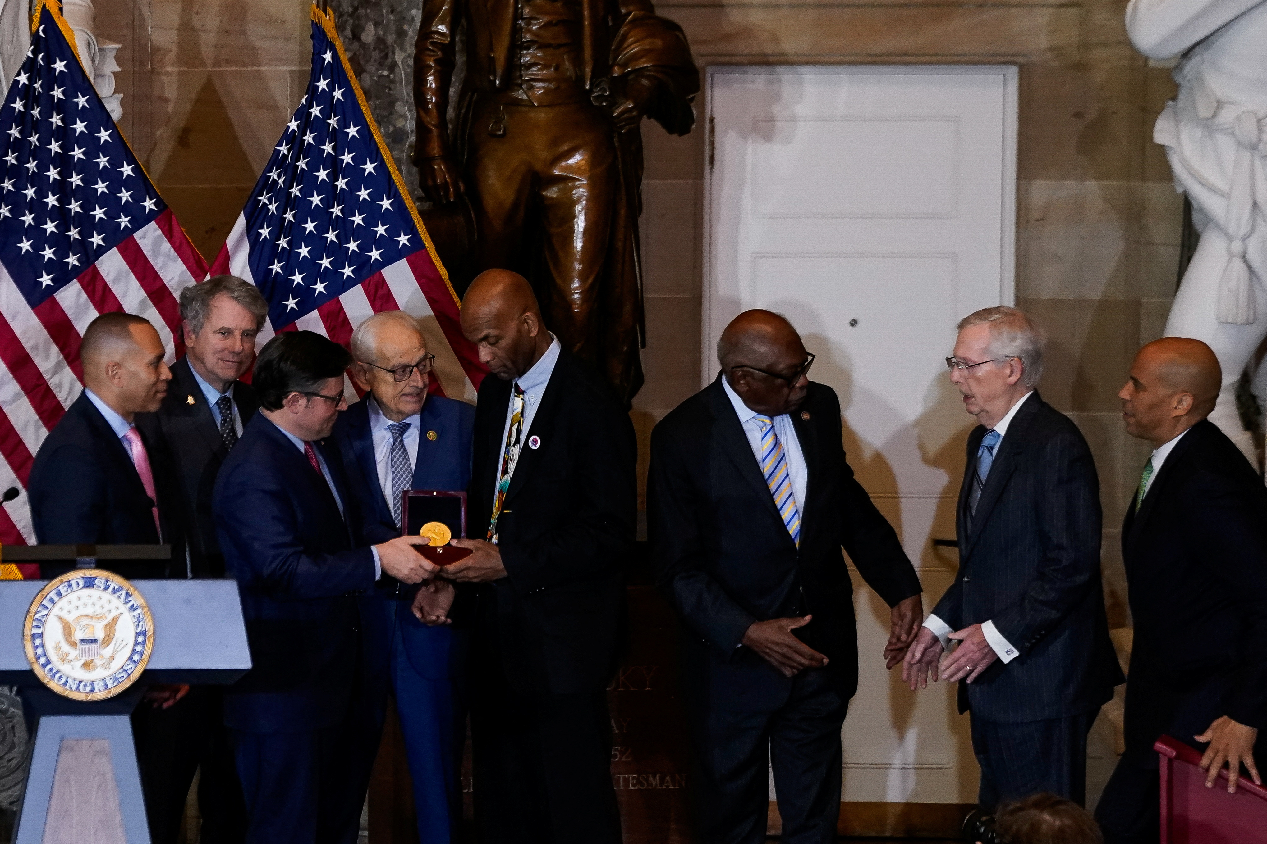 Larry Doby, Jr., accepts the Congressional Gold Medal posthumously honoring his father, Major League Baseball player, civil rights activist and World War II veteran, Lawrence Eugene “Larry” Doby, during a ceremony in Statuary Hall at the U.S. Capitol in Washington, U.S., December 13, 2023. 