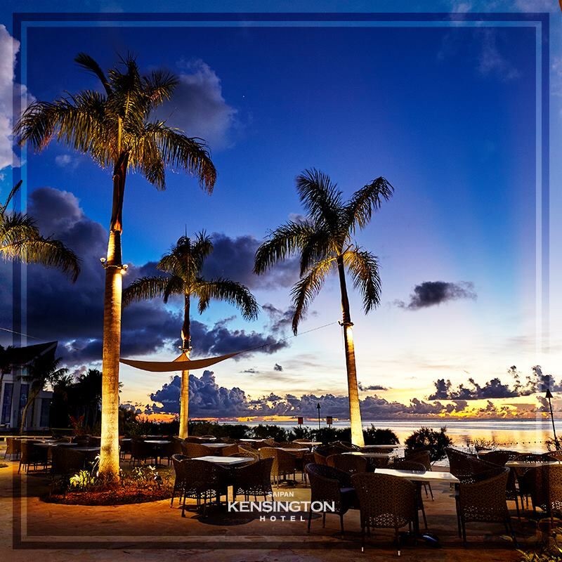 A sunset-lit evening at Kensington Hotel's outdoor dinner setting.