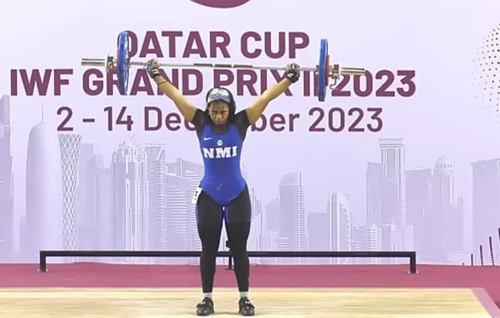 Cheyanne Manuel  completes her snatch attempt during the 2023 International Weightlifting Federation Grand Prix II in Doha, Qatar.