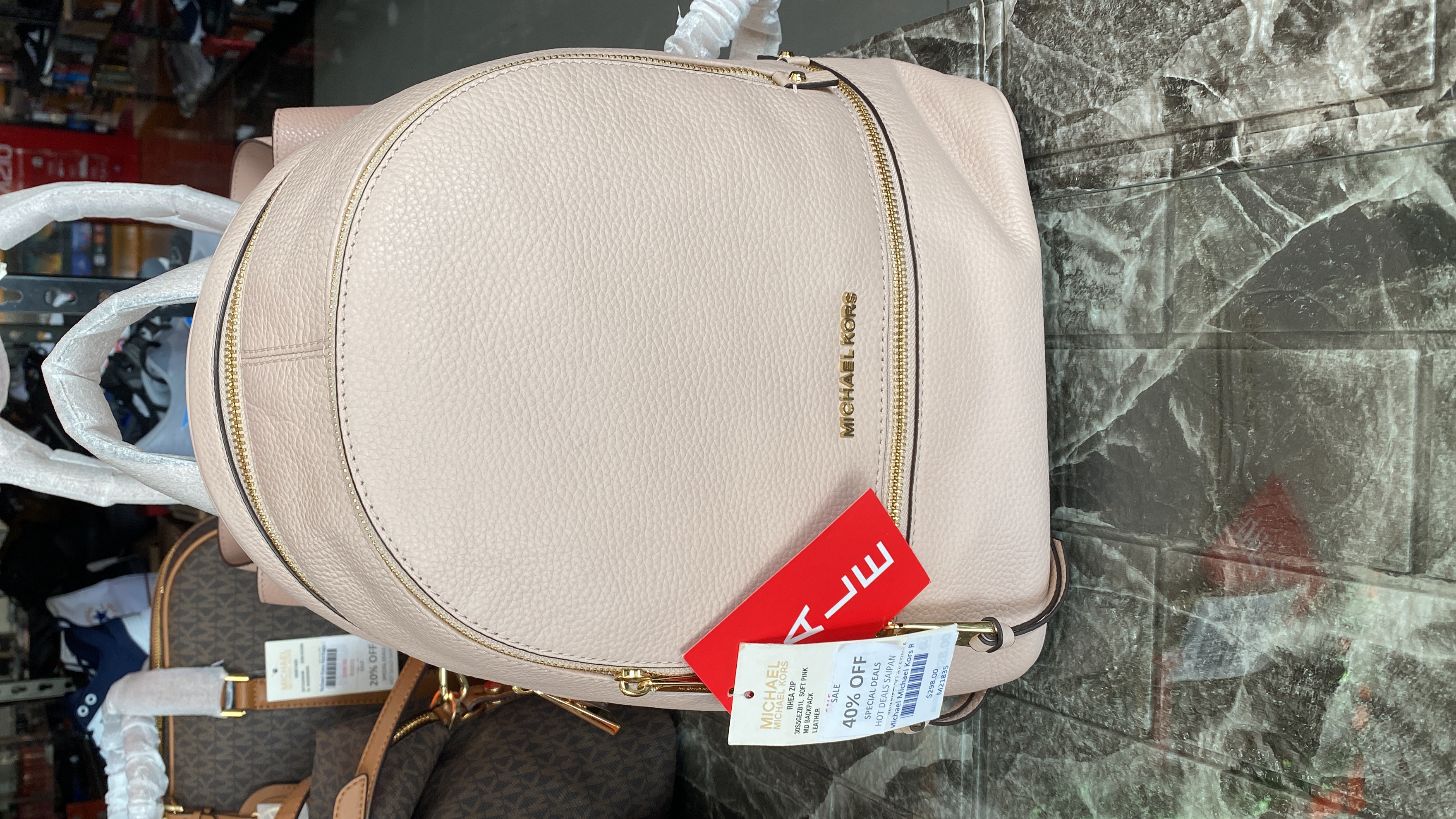 We all have that one bougie aunty who loves Micheal Kors. Get her this backpack, on promo at Hot Deals Saipan.