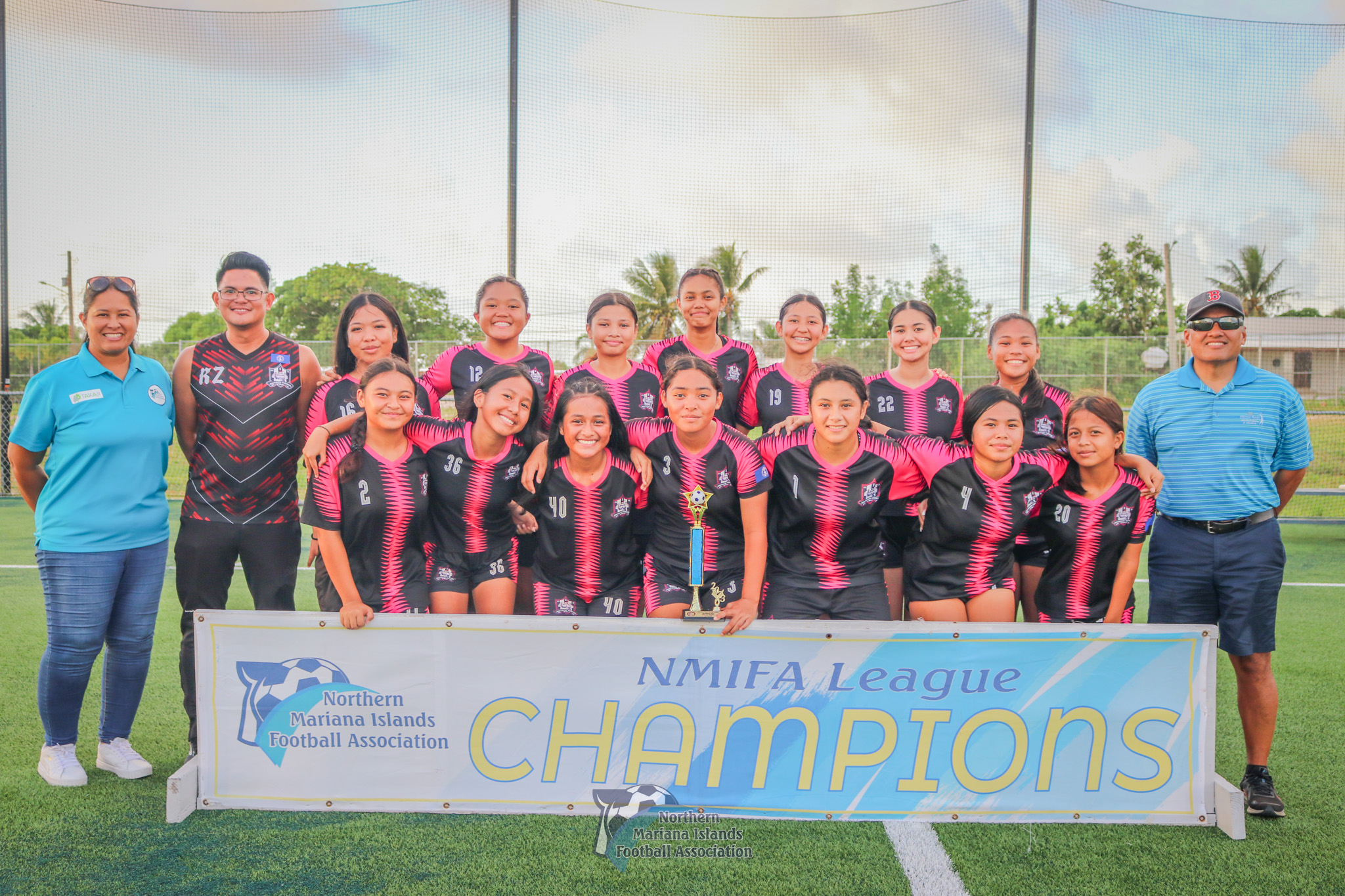 The Southern United Football Club members pose for a photo after defeating MP United, 7-2,  to win the U17 girls division title  on Saturday  at the NMI Soccer Training Center in Koblerville.