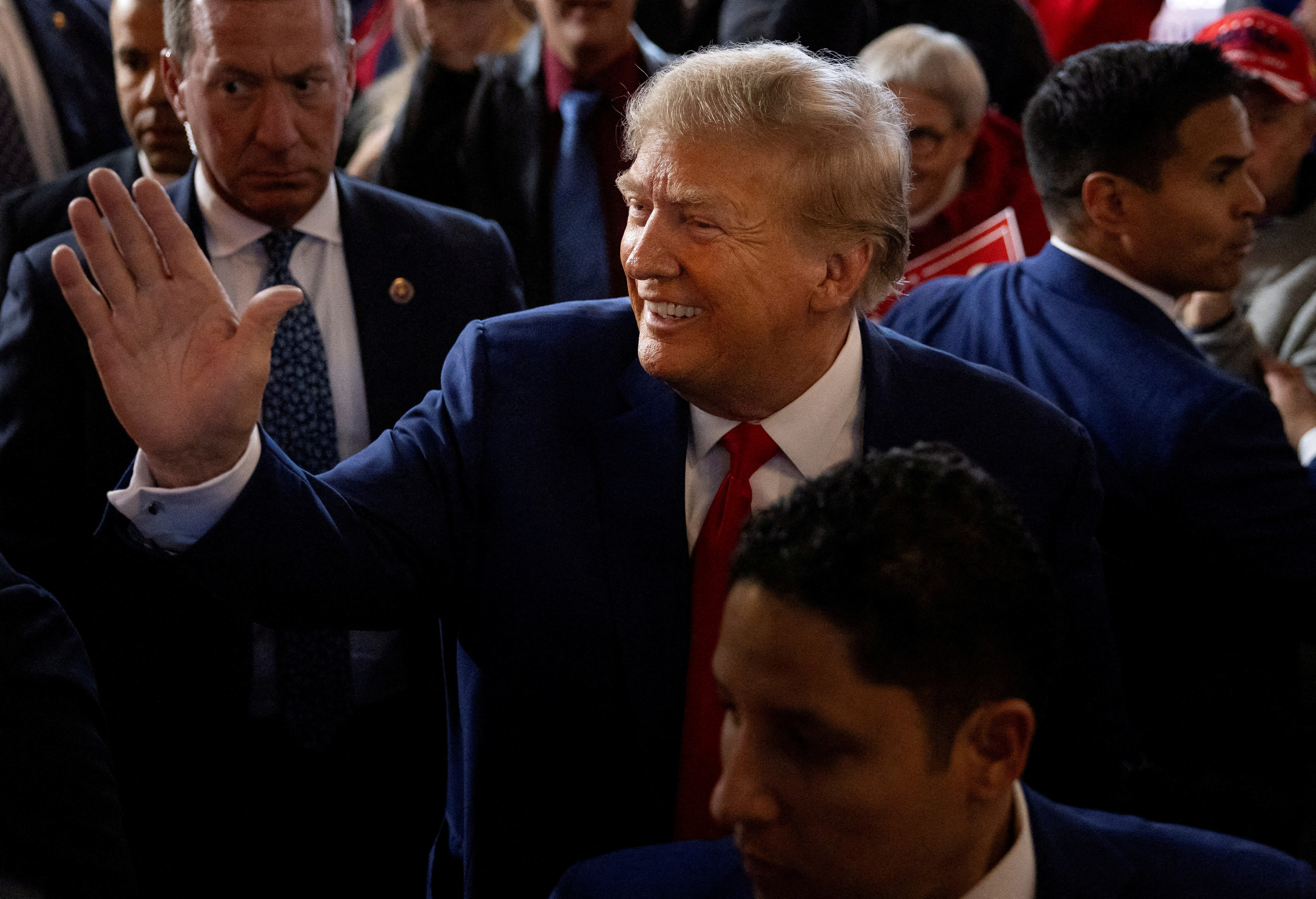 Former U.S. President and Republican presidential candidate Donald Trump rallies with supporters at a "commit to caucus" event at a whiskey bar in Ankeny, Iowa, U.S. December 2, 2023. 
