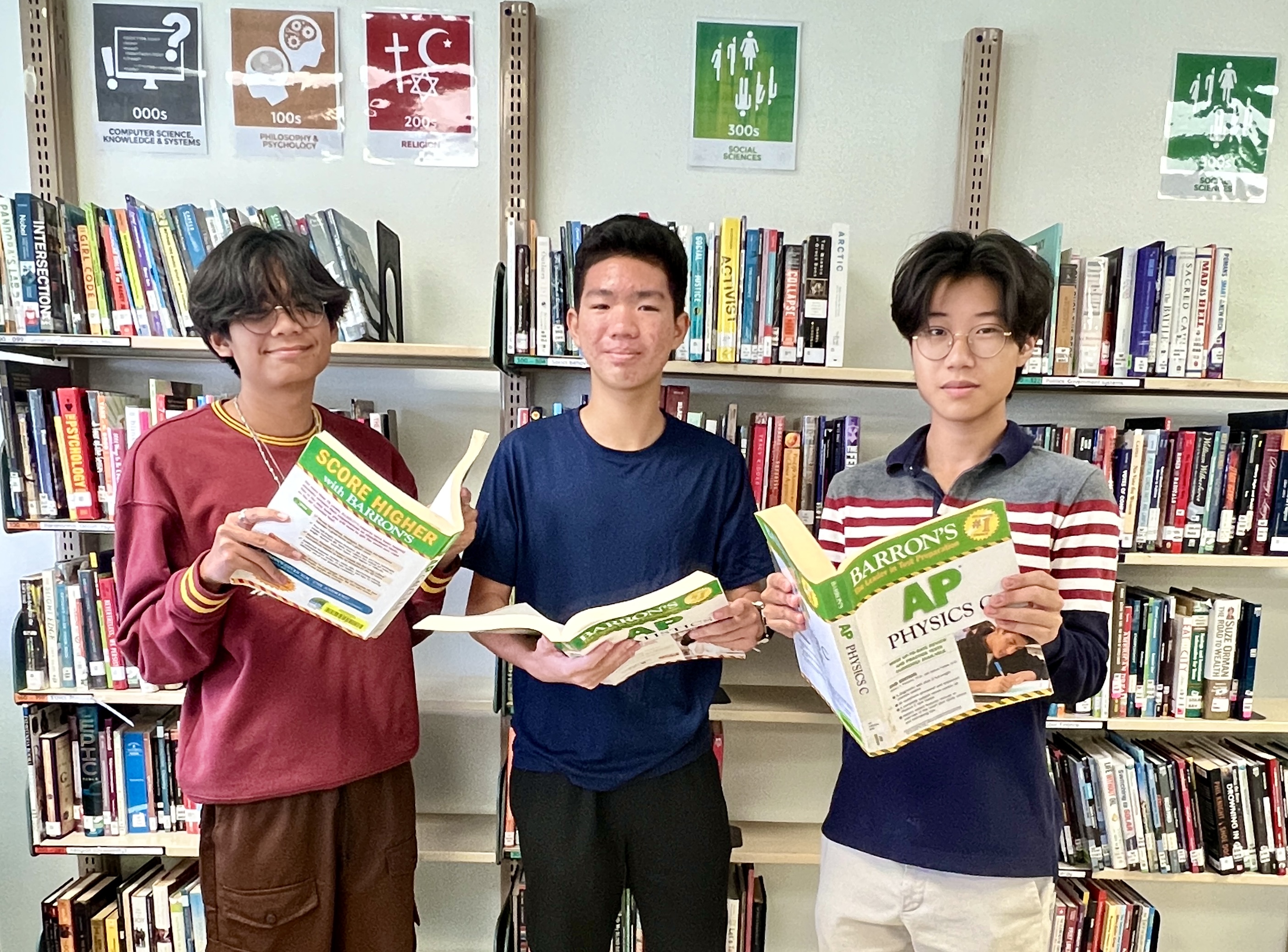 Three of Marianas High School's AP scholars are, from left to right, Jedric Ancieto, Pony Tang, and Gwanpil Son. 