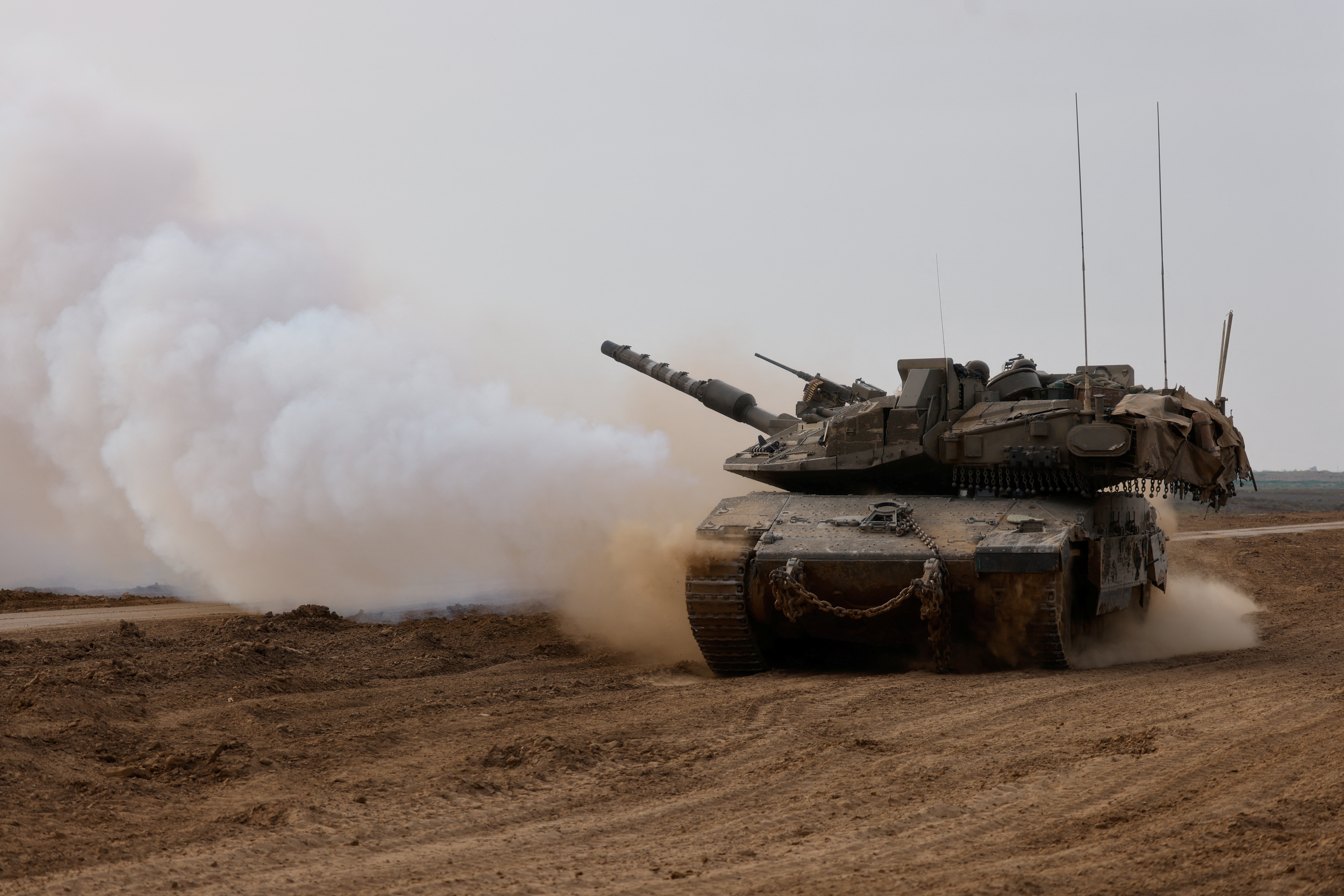 An Israeli tank returns from the southern Gaza strip, in southern Israel, February 26, 2024. 
