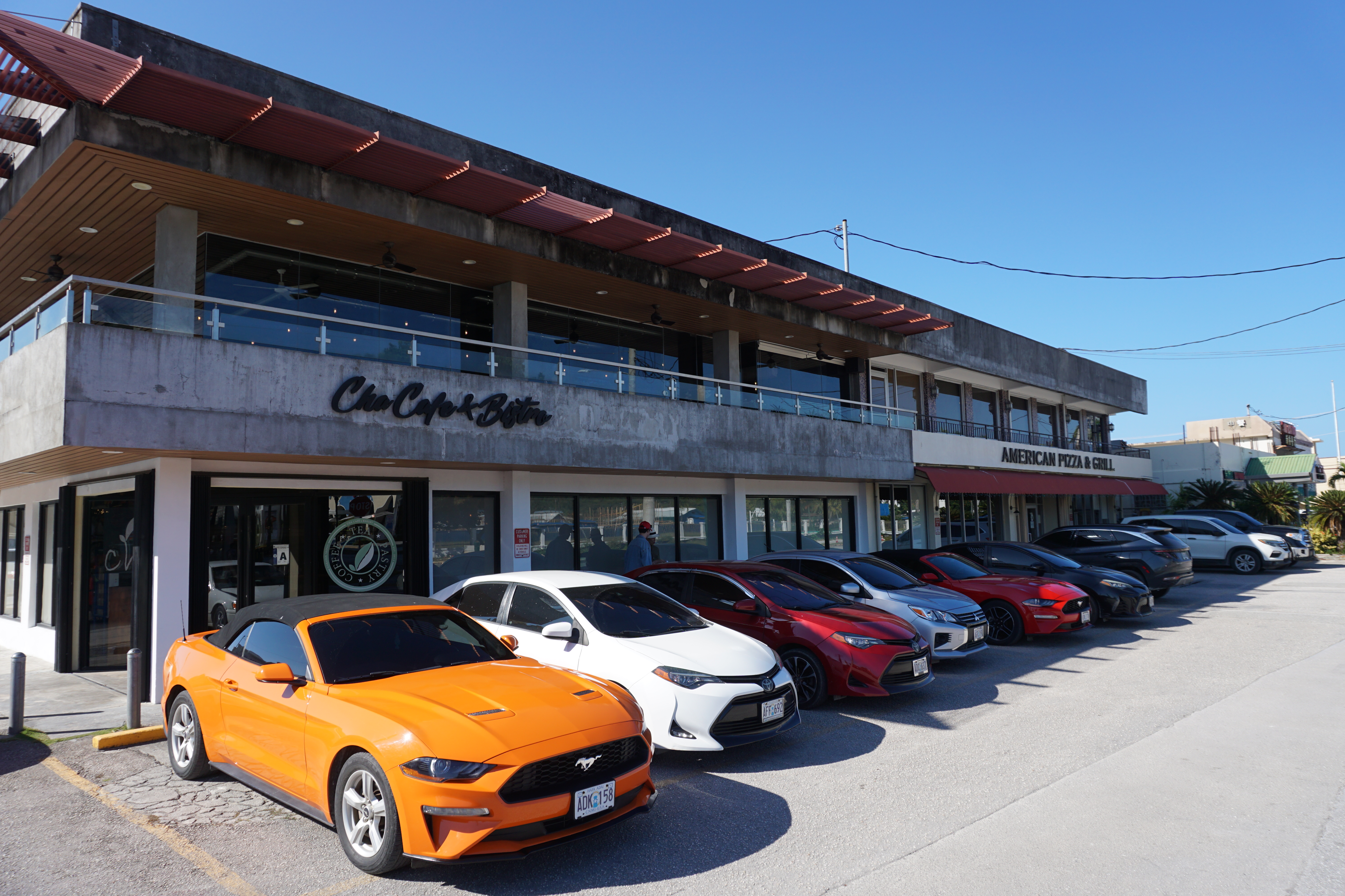 Cha Café and American Pizza and Grill operates in Garapan. John Lee, who run the businesses with his parents, hopes infrastructure projects in the area are completed in an efficient manner. 