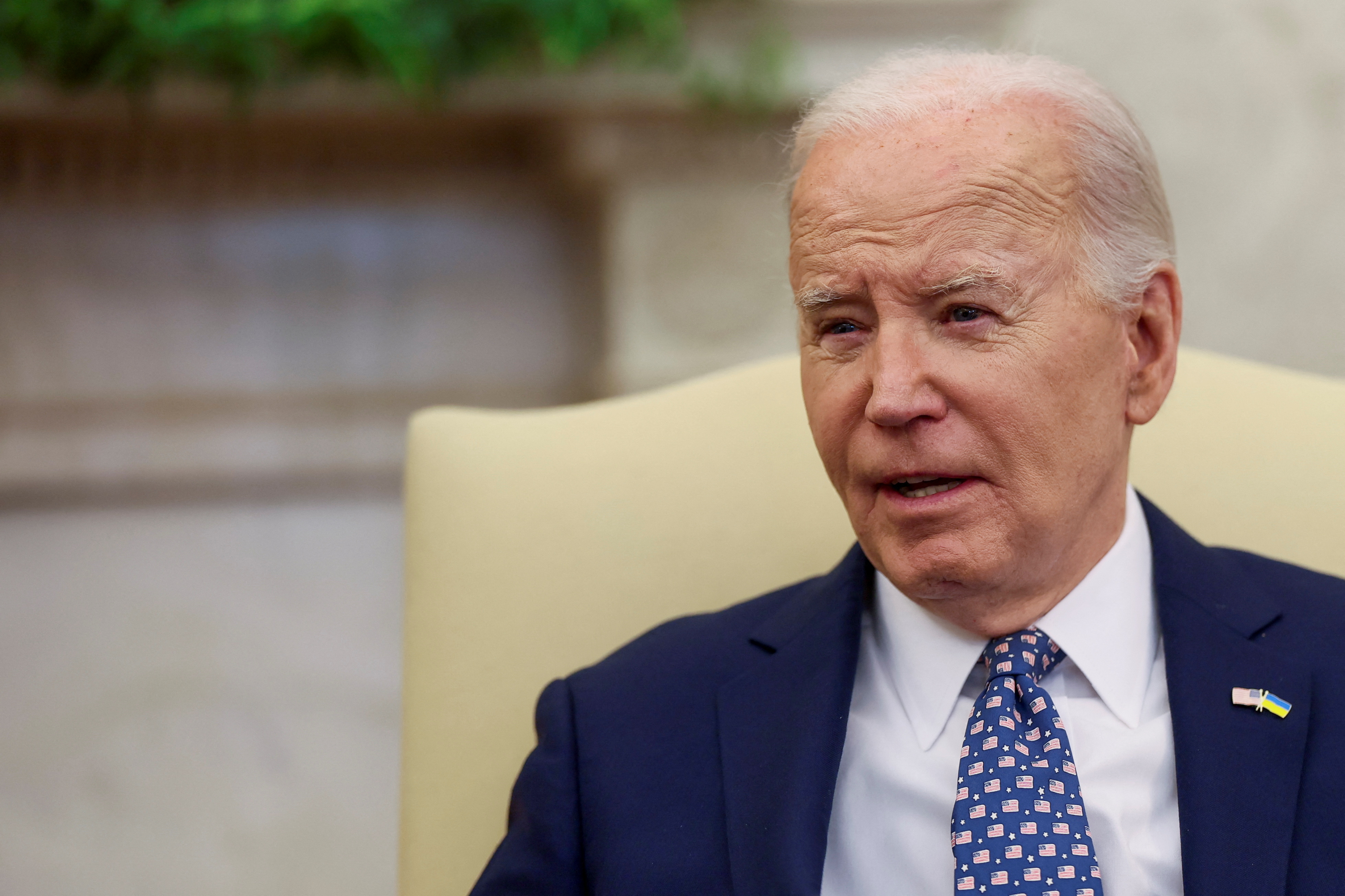 U.S. President Joe Biden looks on as him and Vice President Kamala Harris (not pictured) meet with congressional leaders in the Oval Office at the White House in Washington, U.S., February 27, 2024. 