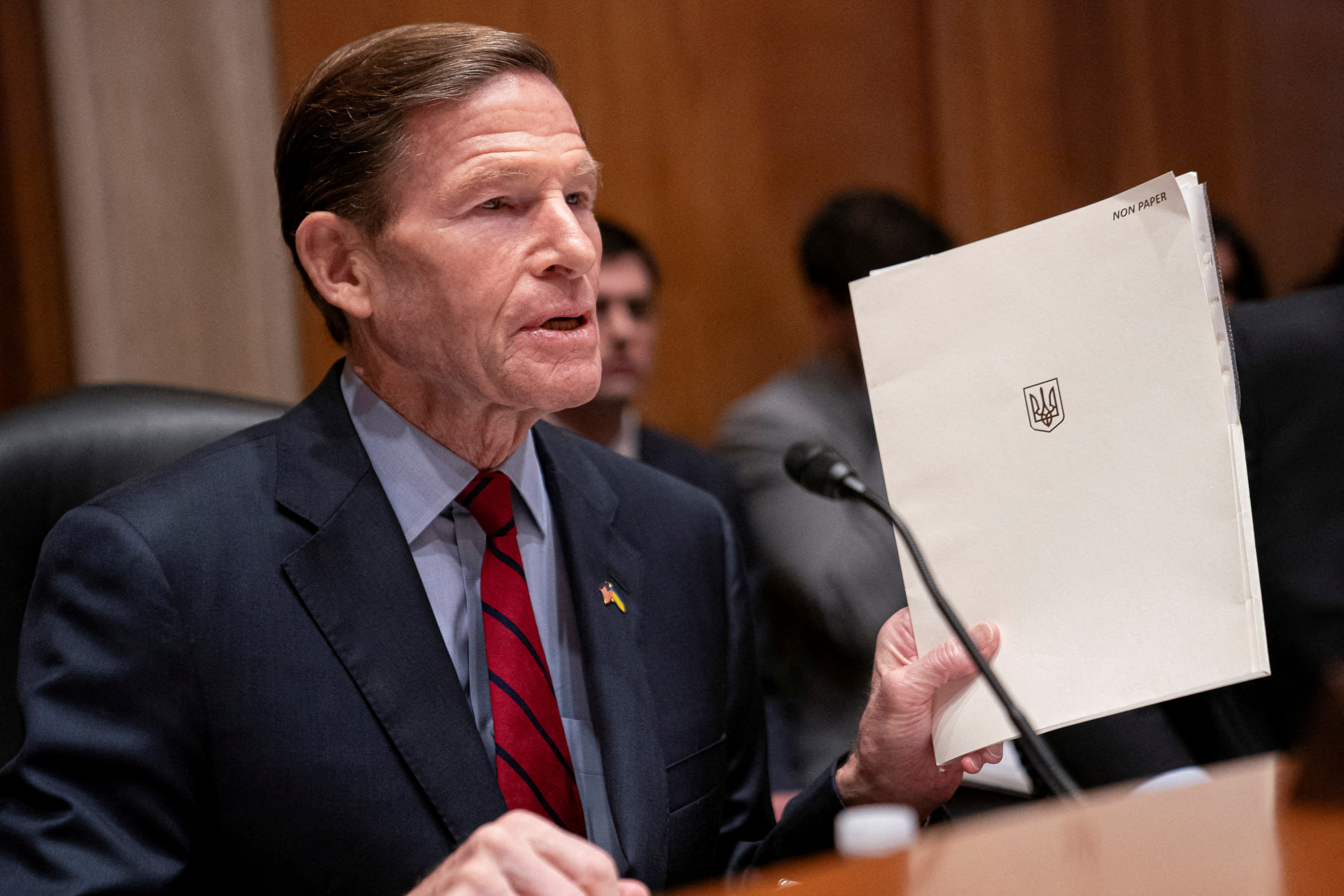 Chairman Sen. Richard Blumenthal (D-CT) holds a file he said was given to him by Ukrainian President Volodymyr Zelenskiy during a Homeland Security and Governmental Affairs Subcommittee on Investigations hearing on the use of U.S. microchips in Russian weapons systems in the Dirksen Senate Office Building in Washington, U.S., February 27, 2024. 