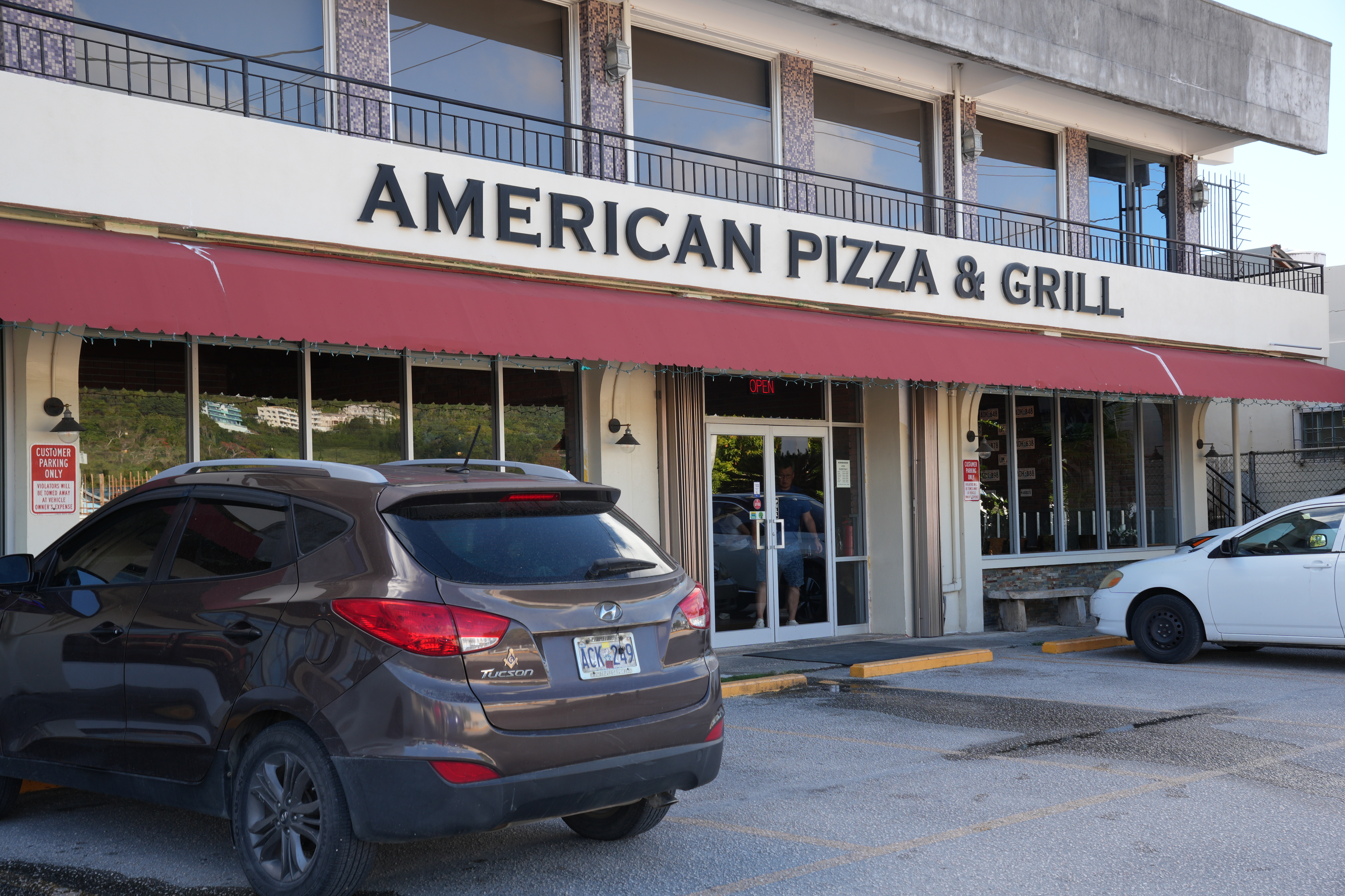 Facade of American Pizza & Grill in Garapan