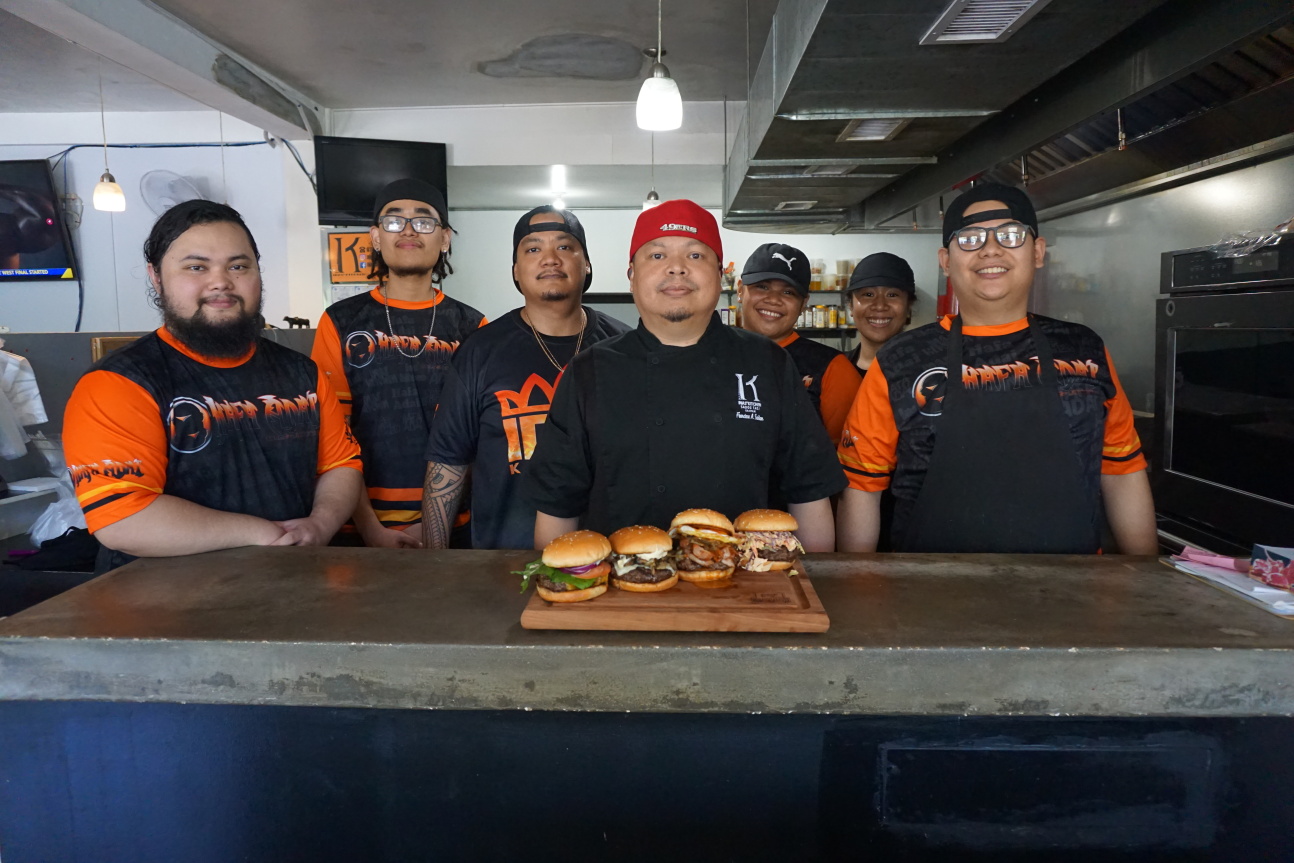 Chef Sonnie Sablan, center, poses for a photo with his Inas’ Kitchen crew.​