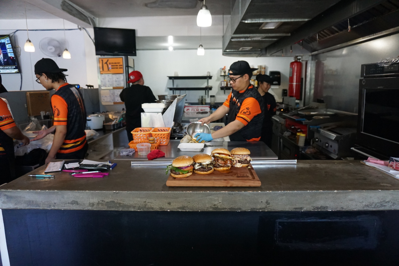 Swing by for lunch and you'll see the Inas’ Kitchen staff hard at work grilling some of the best burgers on island.