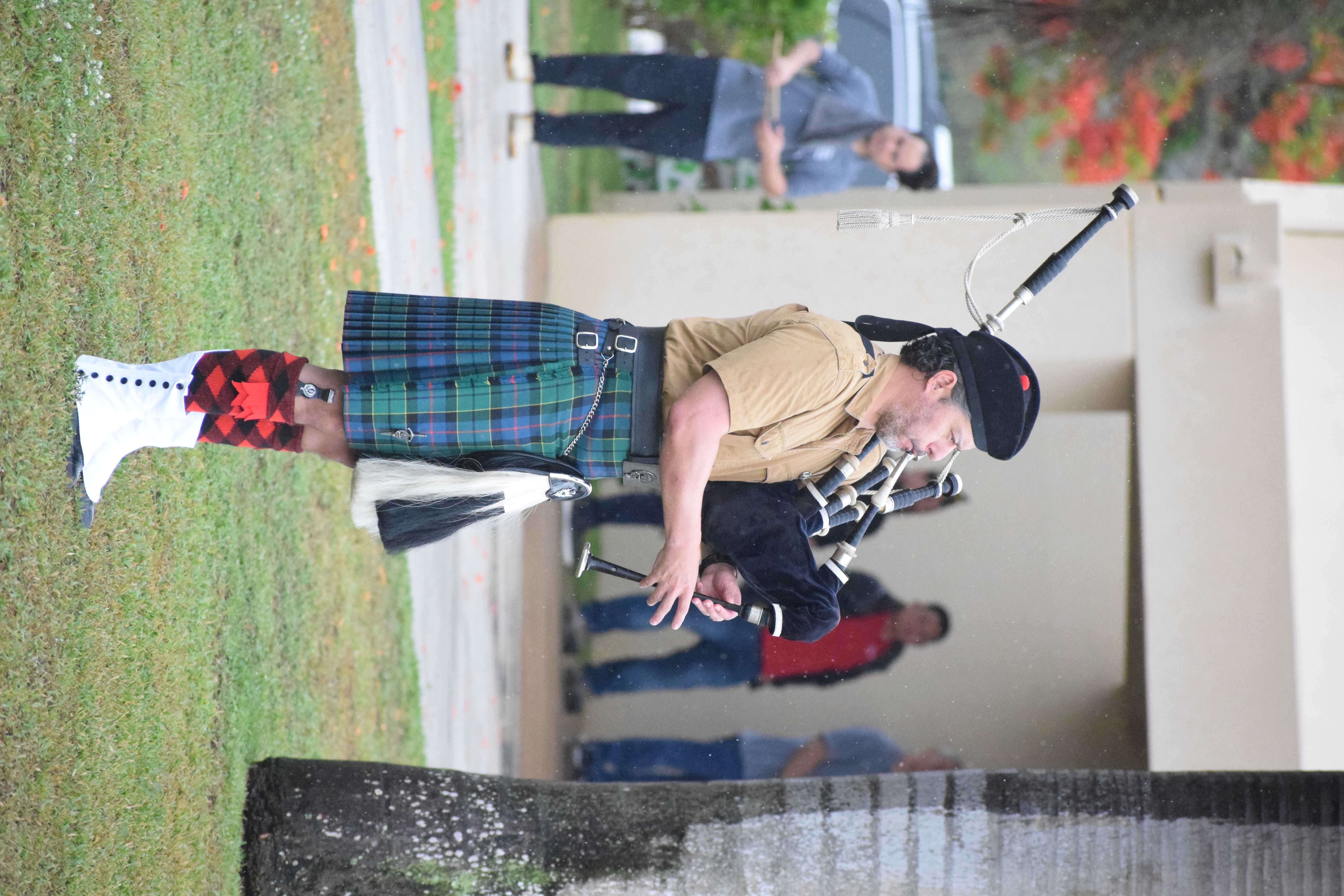 Sam Sosa plays the bagpipe.