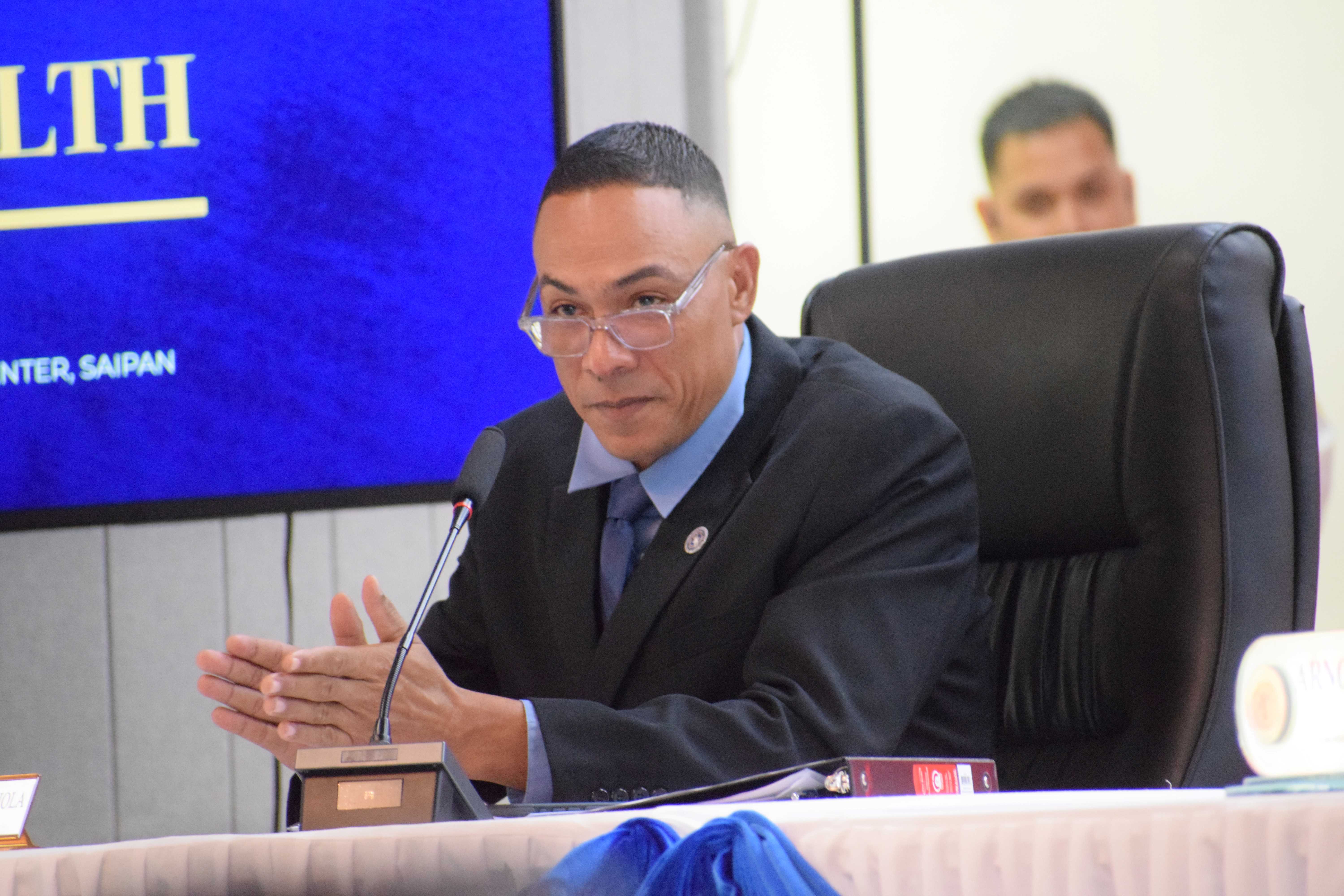 Senate President Dennis James Mendiola applauds at the conclusion of Gov. Arnold I. Palacios' State of the Commonwealth Address.