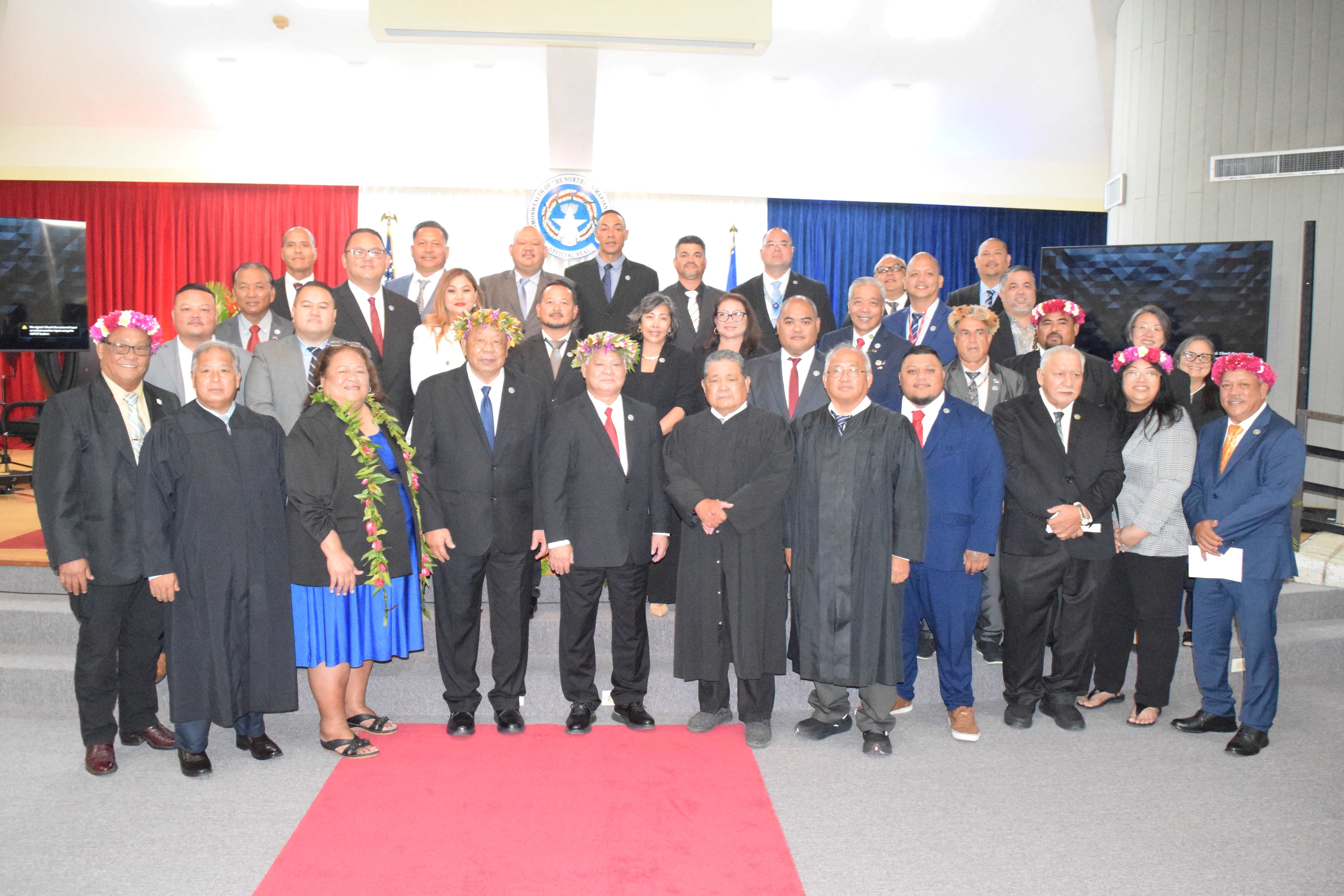 Gov. Arnold I. Palacios, center, and Lt. Gov. David M. Apatang, fourth left, with lawmakers, judicial branch officials, Saipan Mayor Ramon Blas "RB" Camacho, Rota Mayor Aubry Hocog, and Tinian Mayor Edwin P. Aldan, right.