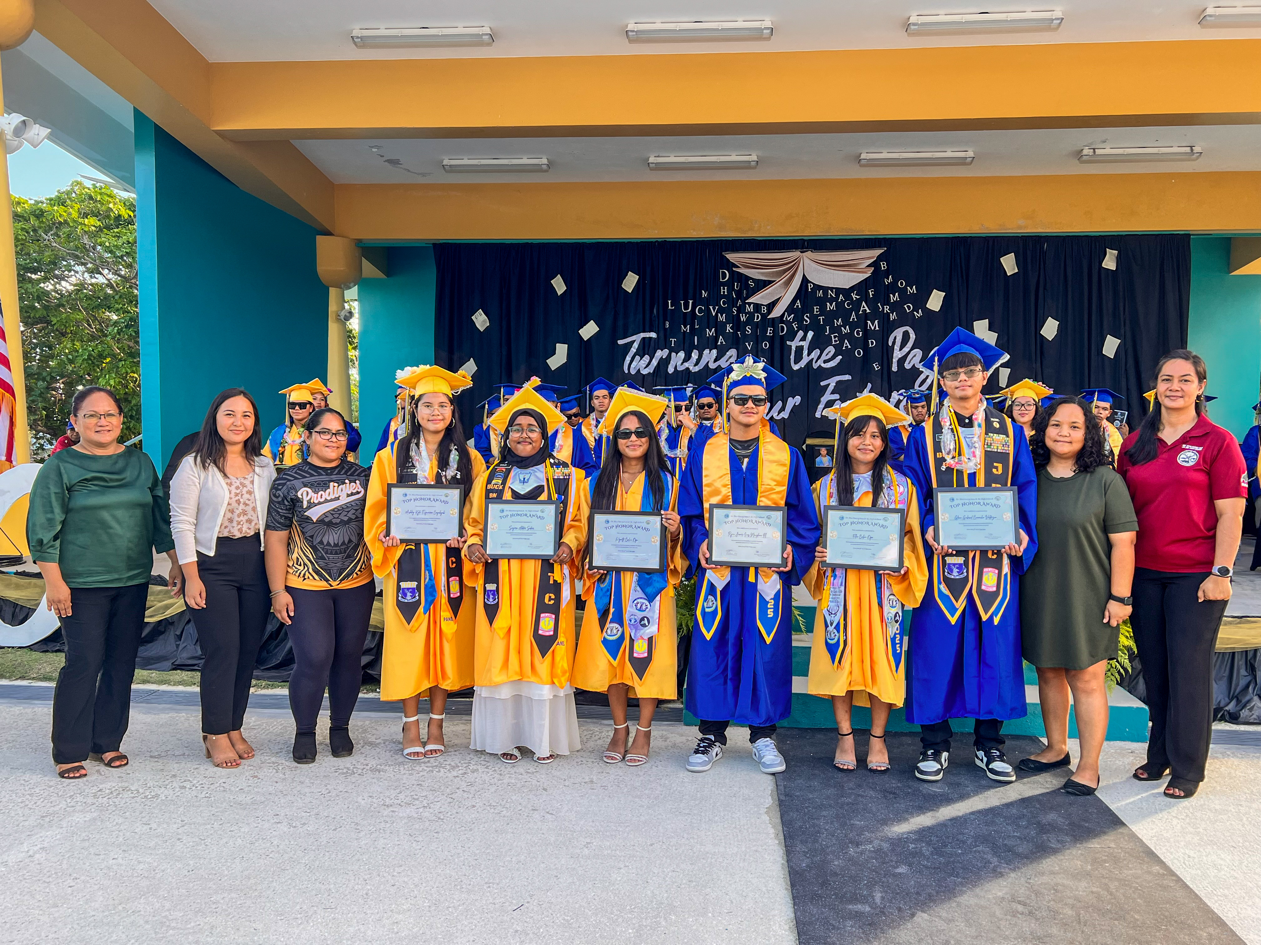 The top six graduates: valedictorian Ashley Kyle Esguerra Cayabyab, salutatorian Sayera Akter Sidur,  Wynette Calvo Ogo, Ryan James Inos Manglona II, Ellie Calvo Ogo, and Glenn Gabriel Camacho Valdezco.