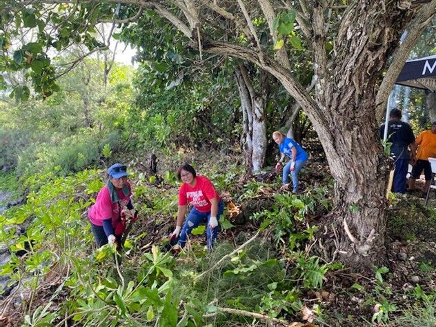 As part of Tourism Month activities, representatives from the Marianas Visitors Authority, Department of Public Works, Tinian Mayor’s Office, and MVA members JC Café and Good Tour conduct a cleanup on May 28, 2025, at a newly reopened swimming hole in western Tinian.
