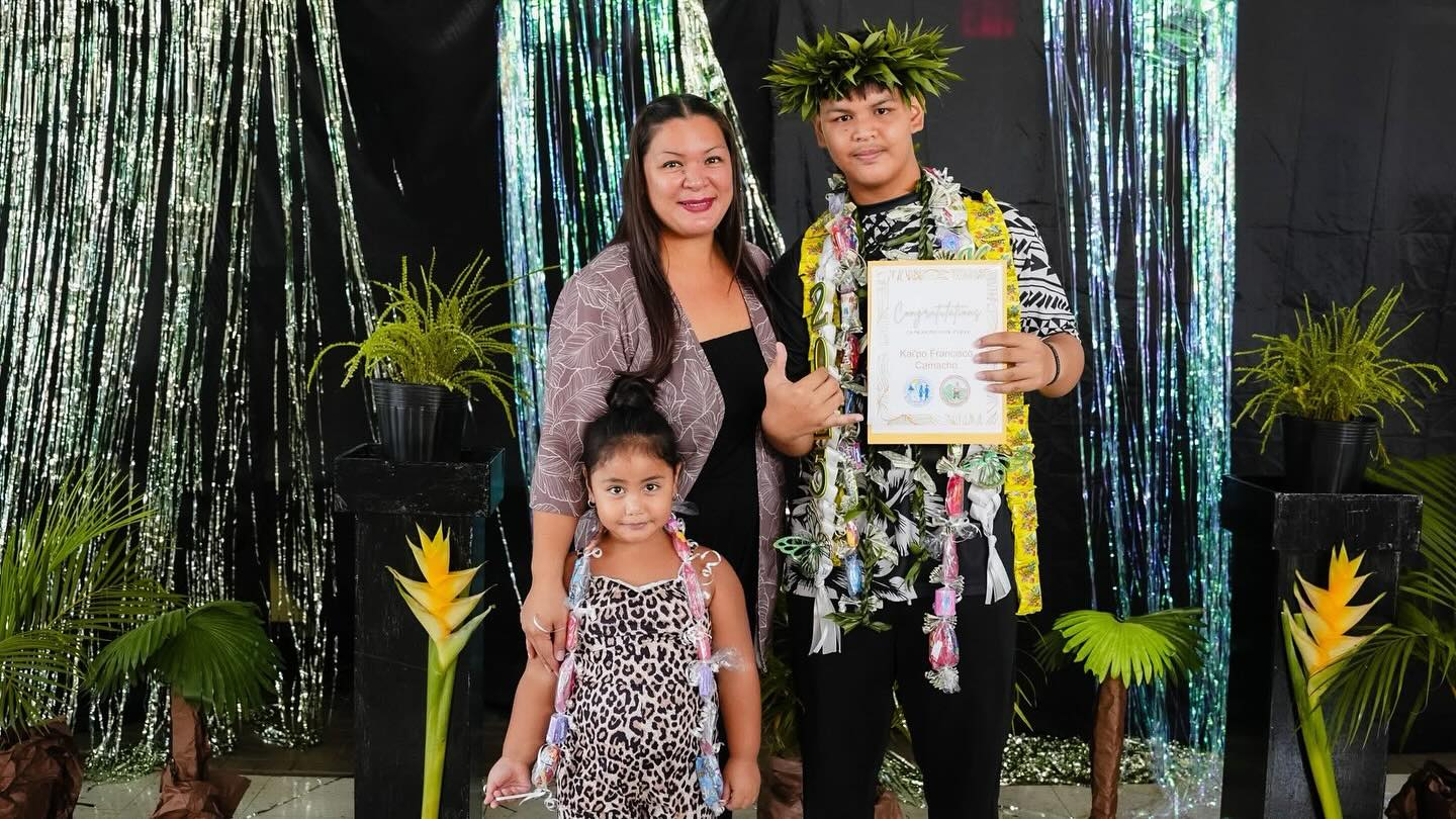 Promoted student Kai'Po Francisco Camacho with his mother, Kimberly, and baby sister and biggest fan, KayLynn Roxanne Camacho.