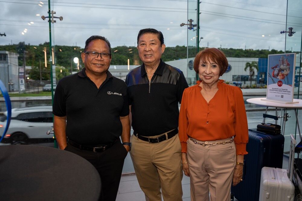 A familiar face in luxury service — longtime Lexus Service Advisor Larry Panagioton shares a moment with valued Lexus customers at its Leather & Luxury event.